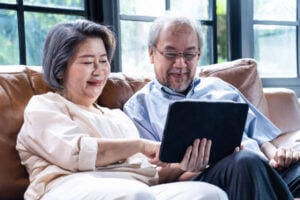 Texas Precious Metals Investing Company chinese couple 300x200